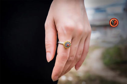 Bague bouddhiste tibétaine, fleur de lotus. Fleur tournante au centre. argent 925, cuivre turquoise ou agate nan hong. Taille réglable. - obsidian dragon