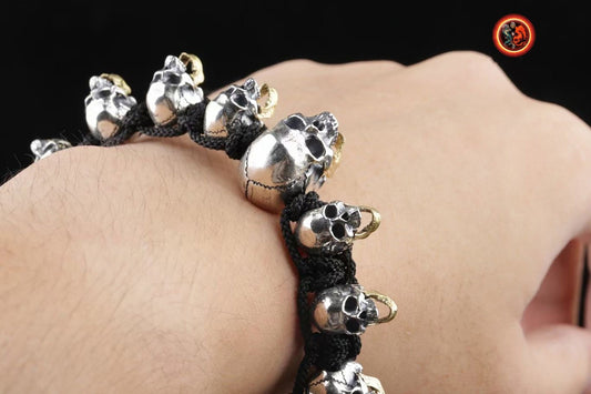 Bracelet cranes, skull. argent 925, mâchoire inférieure mobile en laiton Tressé avec de la corde pour parachute ultra resistante, reglable - obsidian dragon