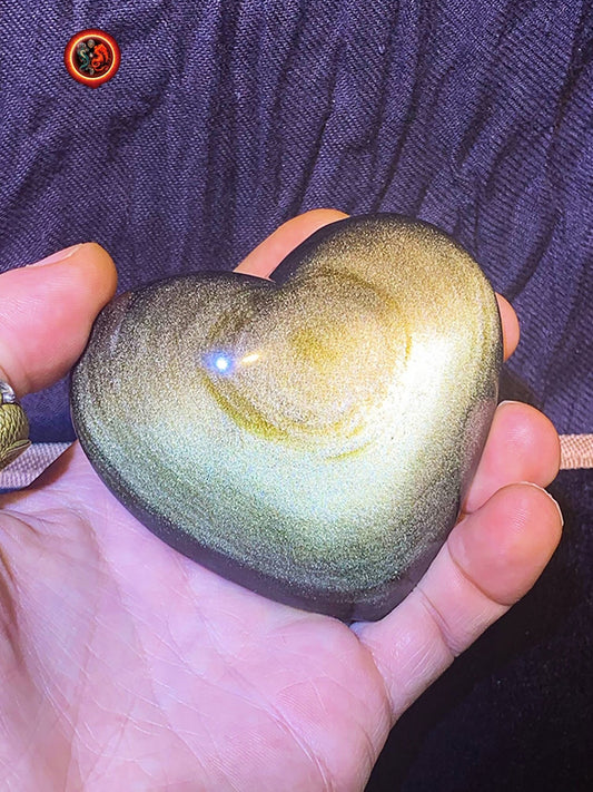 coeur en obsidienne dorée. Originaire du Mexique. Qualité A+ Dimensions de 85/80/42mm poids de 0,257kg - obsidian dragon