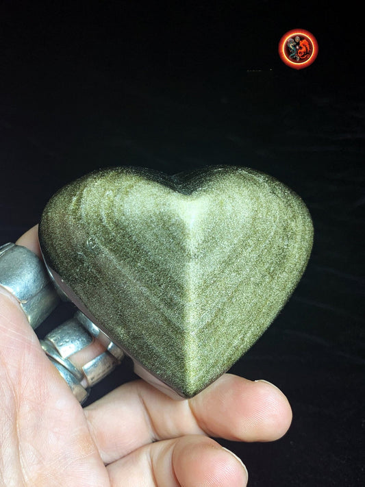 coeur en obsidienne dorée. Originaire du Mexique. Qualité A+ Dimensions de 56/76/46mm poids de 0,246kg - obsidian dragon