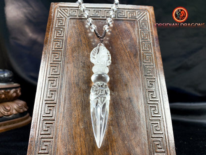 Pendentif dague phurba en cristal de roche, bouddhisme vajrayana. Dague rituelle pour chasser les démons - obsidian dragon