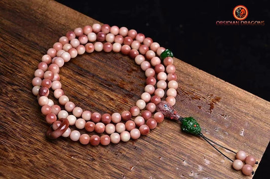 Mala, chapelet bouddhiste traditionnel tibétain. 108 perles d'os de chameau, jade . méditation sur l'impermanence - obsidian dragon