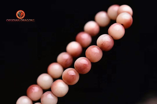 Mala, chapelet bouddhiste traditionnel tibétain. 108 perles d'os de chameau, jade . méditation sur l'impermanence - obsidian dragon