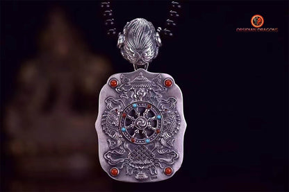 Pendentif bouddha Amitabha. Amulette de protection du bouddhisme vajrayana esoterique tibétain. représentation de Garuda sur la beliere. - obsidian dragon