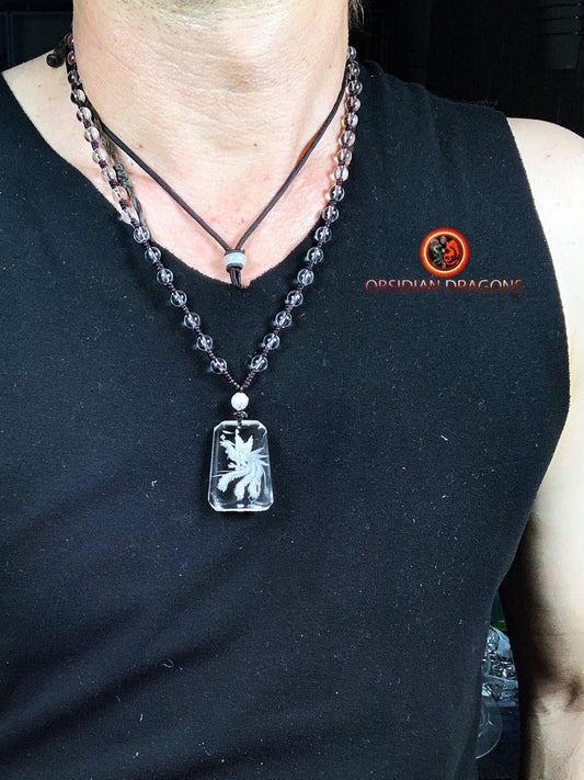 Pendentif phenix en cristal de roche- intaille