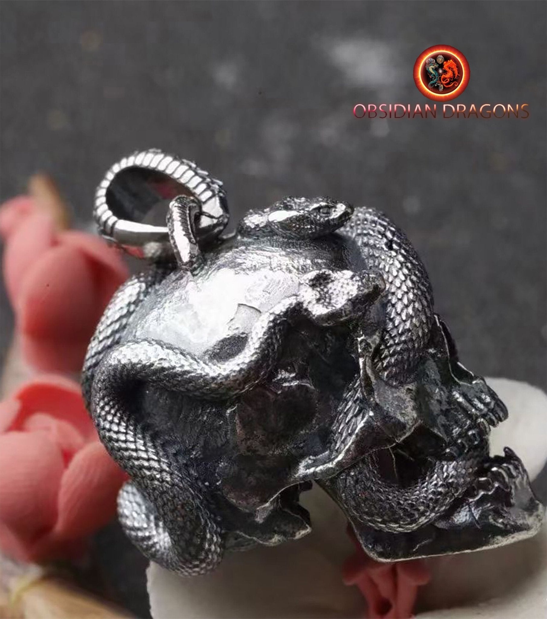 Pendentif crâne. Tete de mort et serpent. Argent 925 poinçonné - obsidian dragon